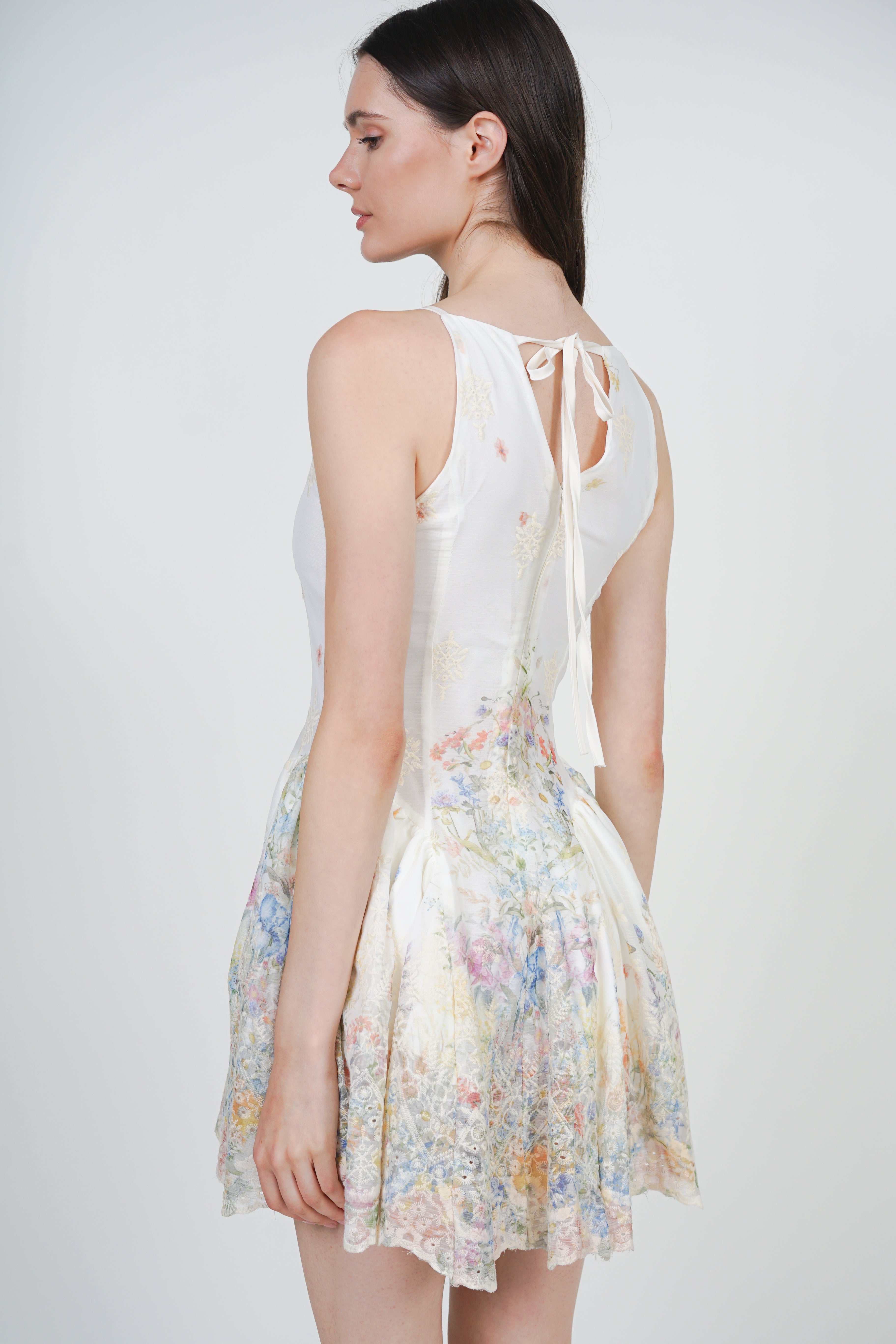 Sleeveless Side Pleated Mini Dress in White Floral