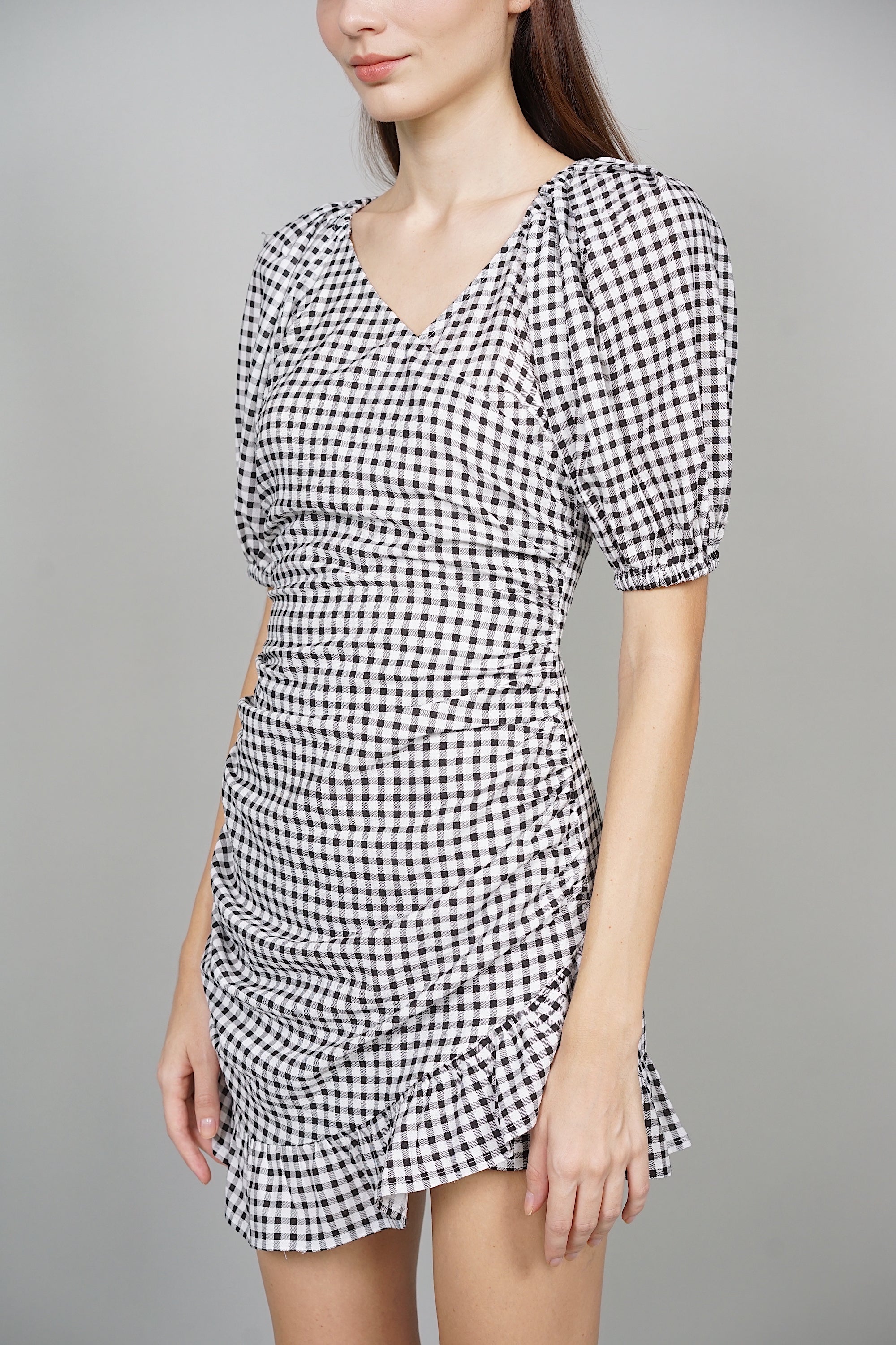 Joy Puffy Skorts Romper in Black Gingham