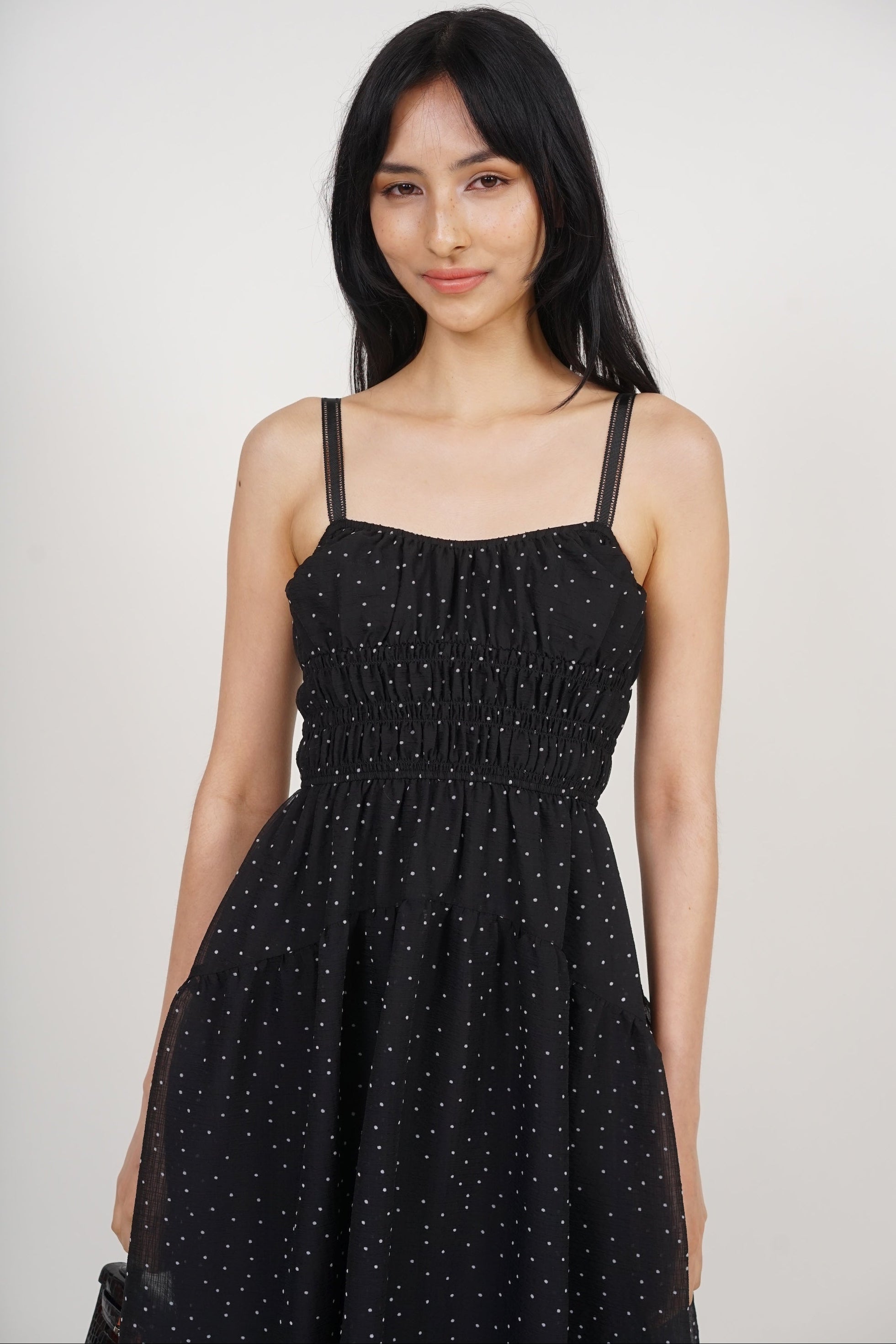 Sleeveless Smocked Flare Dress in Black White Polka Dots
