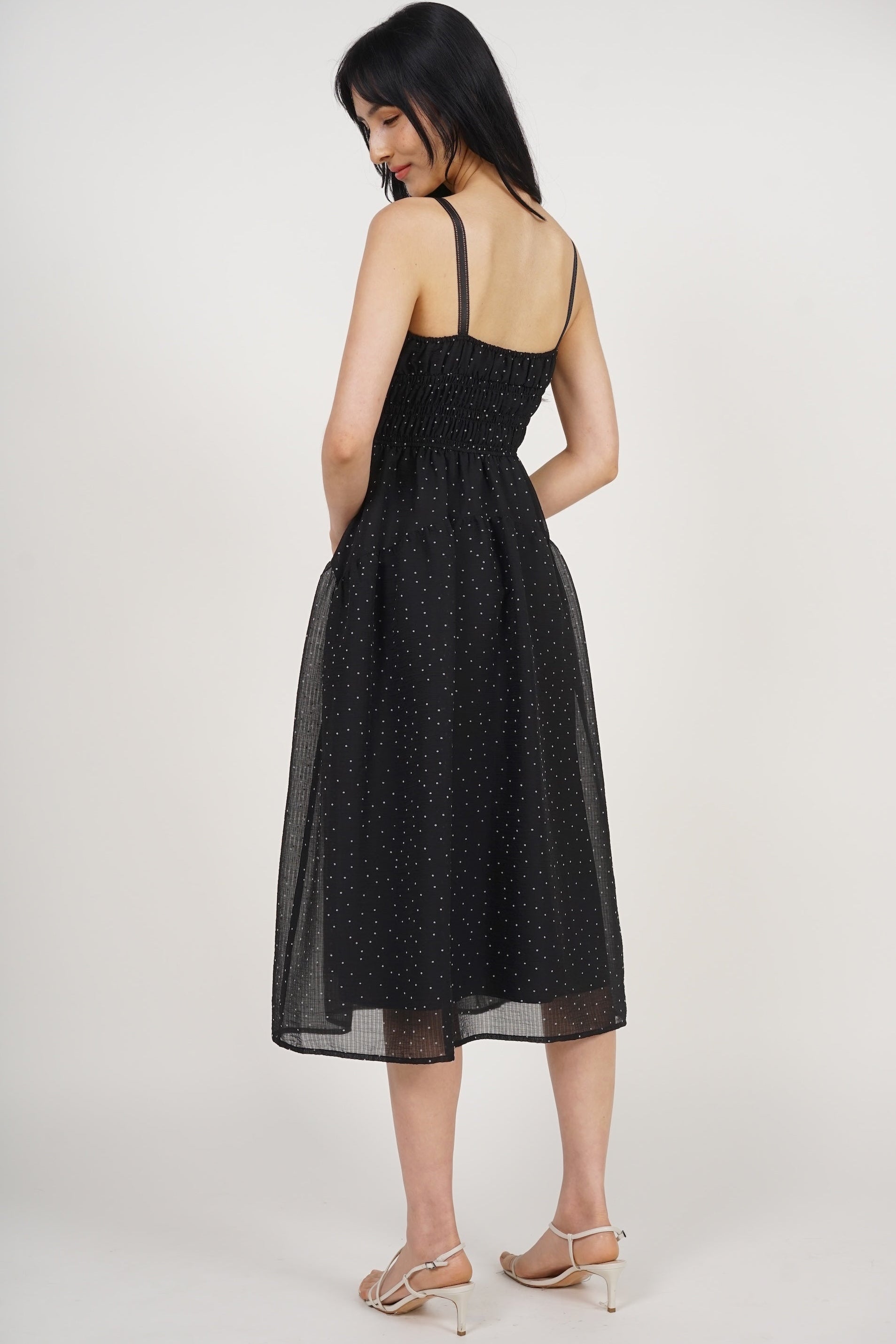 Sleeveless Smocked Flare Dress in Black White Polka Dots