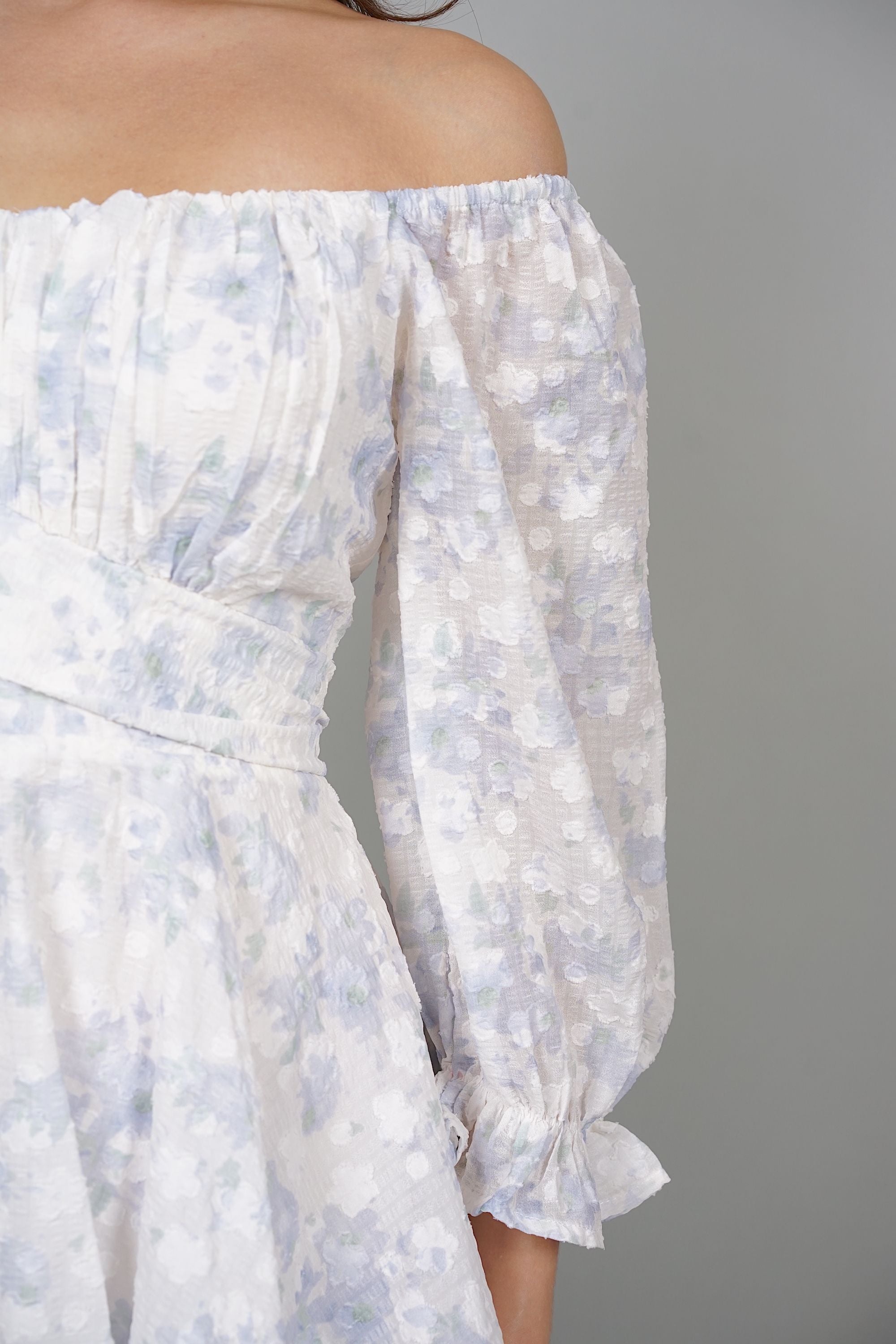 Renee Puffy Ruffled Romper in Blue Floral
